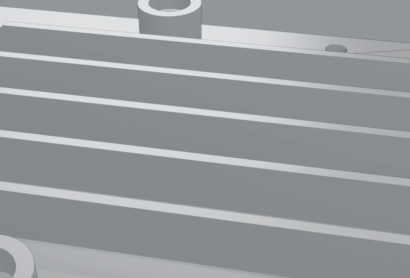 Close Blender view along the five heat sink fins, exposing their ramped starts, chamfered ends and relationship to a counterbored boss.